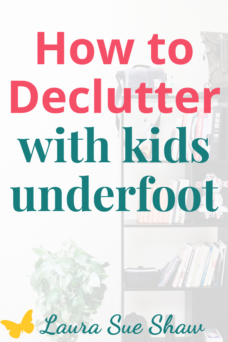 Need ides on how to declutter with kids underfoot? Check out my strategy that I've used to clear the clutter with a busy toddler by my side.